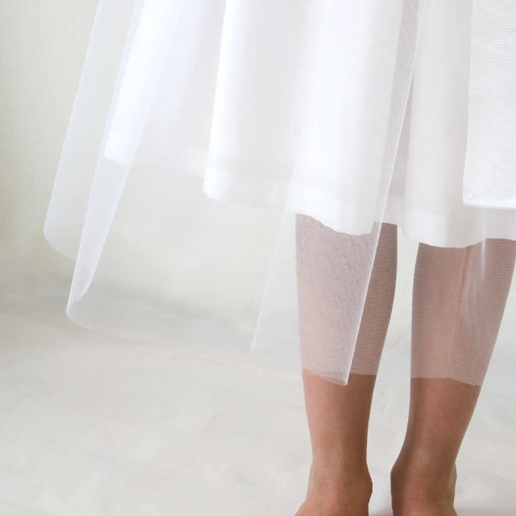 der 3/4 Lange Tüllrock zur Kommunion oder als Blumenmädchenkleid zur Hochzeit. schlichte natürliche Kommunionkleider aus München.